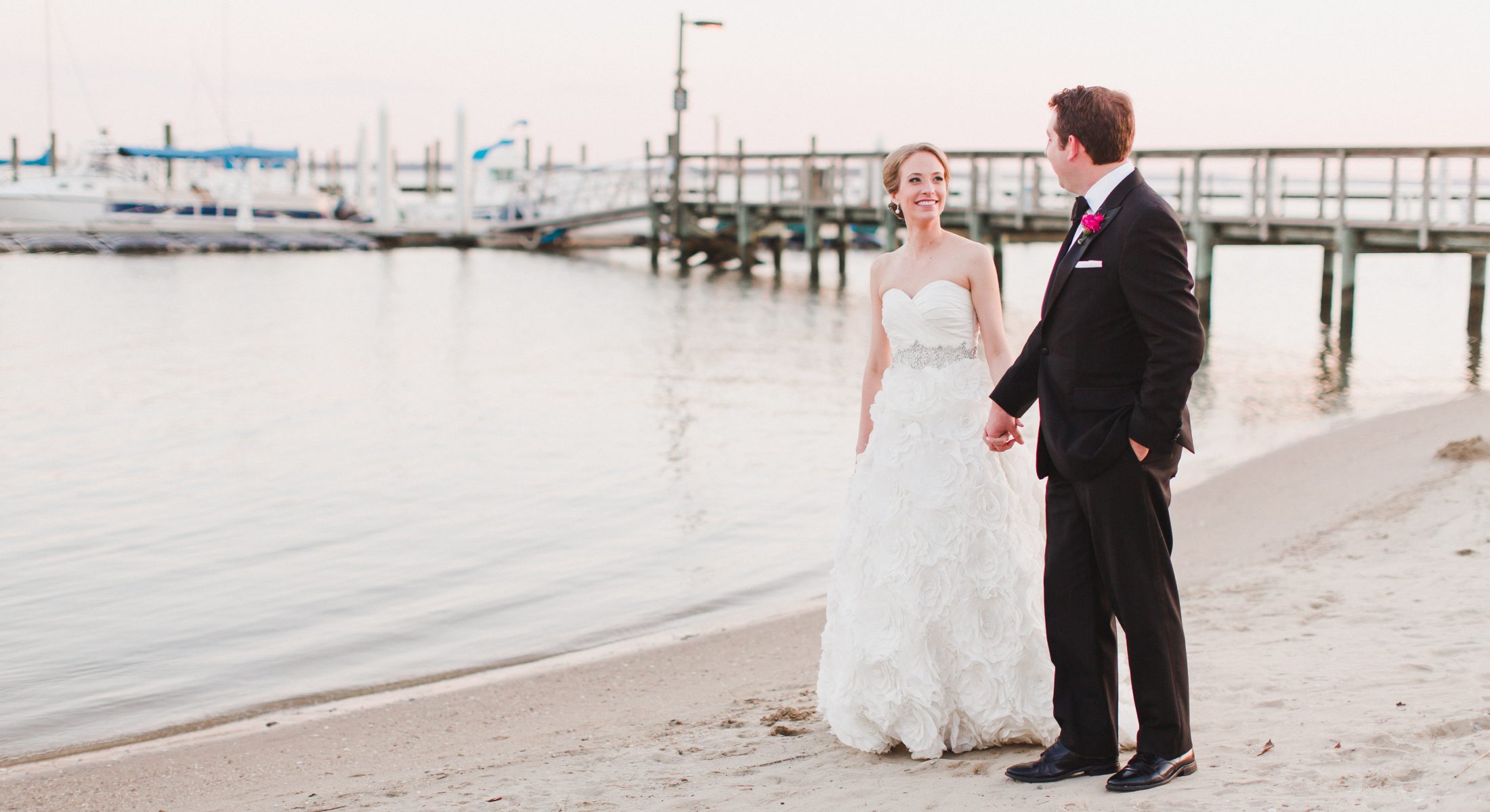 Wedding Couple on Beach with Marina in Background
