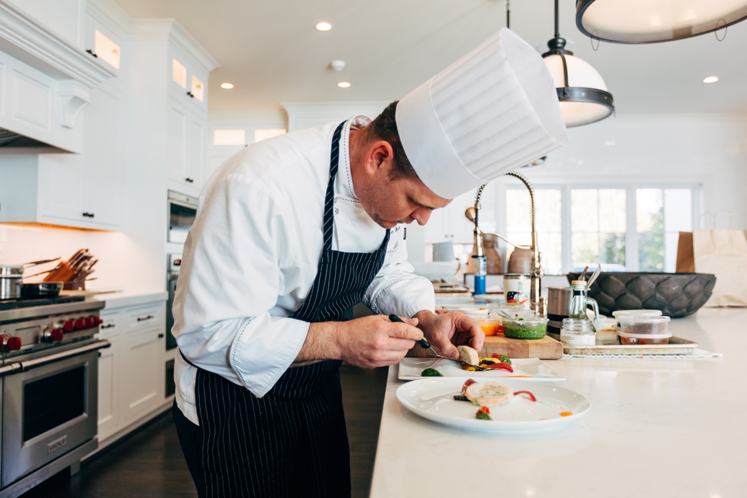 Dedicated Estate Chef preparing a personalized meal